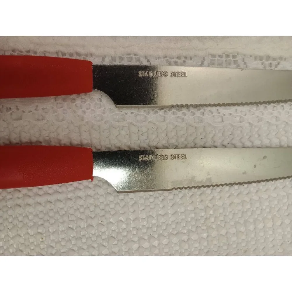 Vintage red plastic handled silverware, miscellaneous pieces